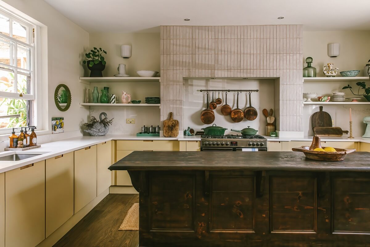 A Georgian House in England with Bold Color Pops 8 rustic-wooden-kitchen-island-yellow-cupboards-nordroom