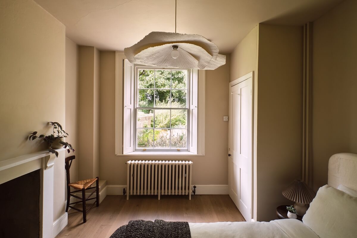 A Beautiful Chapel Conversion in England 16 serene-bedroom-fireplace-chapel-conversion-nordroom