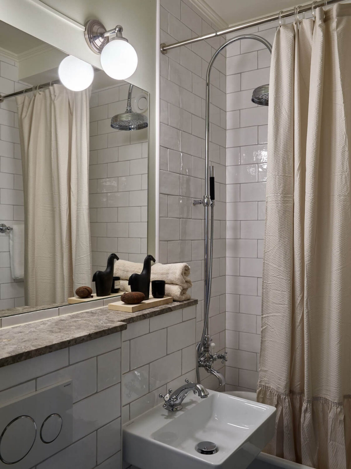 Beige Walls in a Serene Family Apartment in Sweden 26 small-bathroom-clawfoot-bath-nordroom