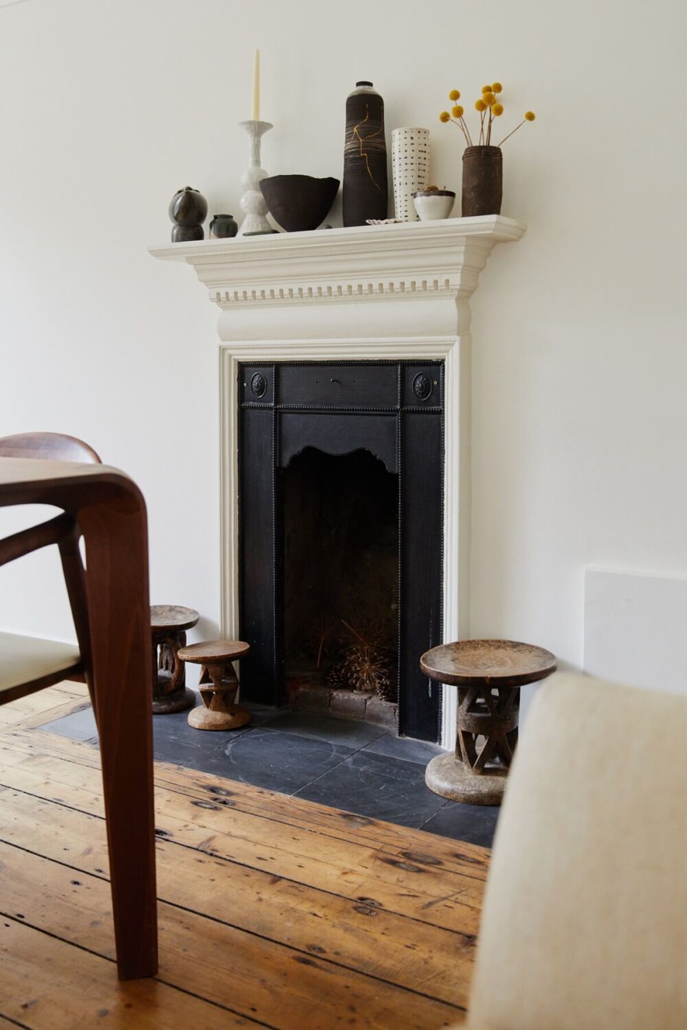 A London Apartment with a Small Blue deVOL Kitchen 3 small-fireplace-wooden-floorboards-nordroom