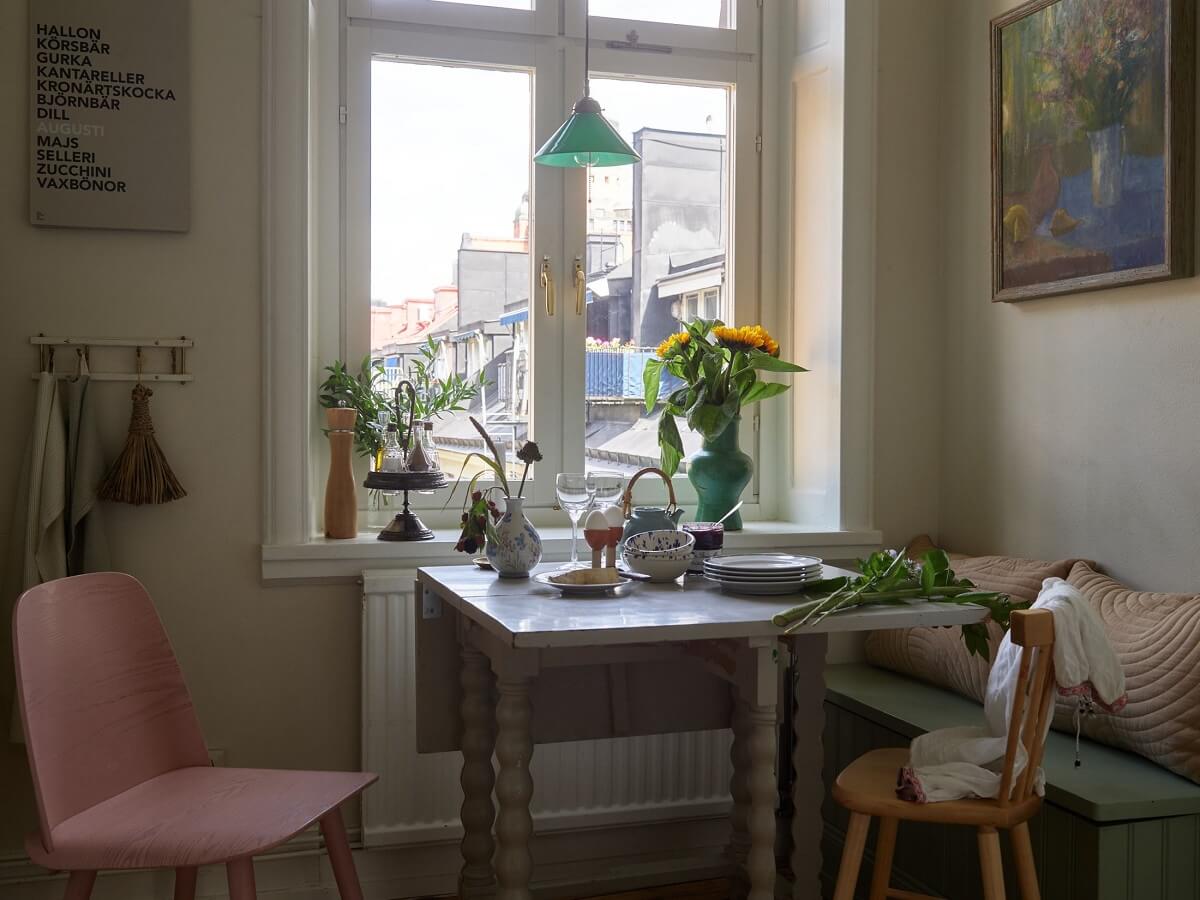 Beige Walls in a Serene Family Apartment in Sweden 9 small-kitchen-table-bench-nordroom