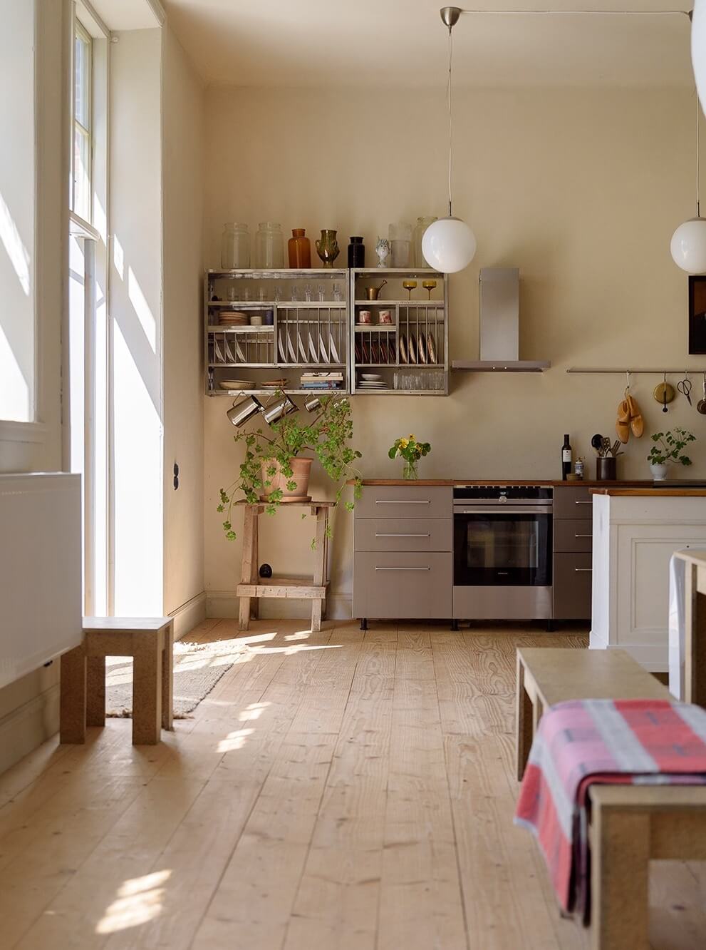 Natural Colors in a Swedish School Conversion 11 spacious-kitchen-wooden-floor-school-conversion-nordroom