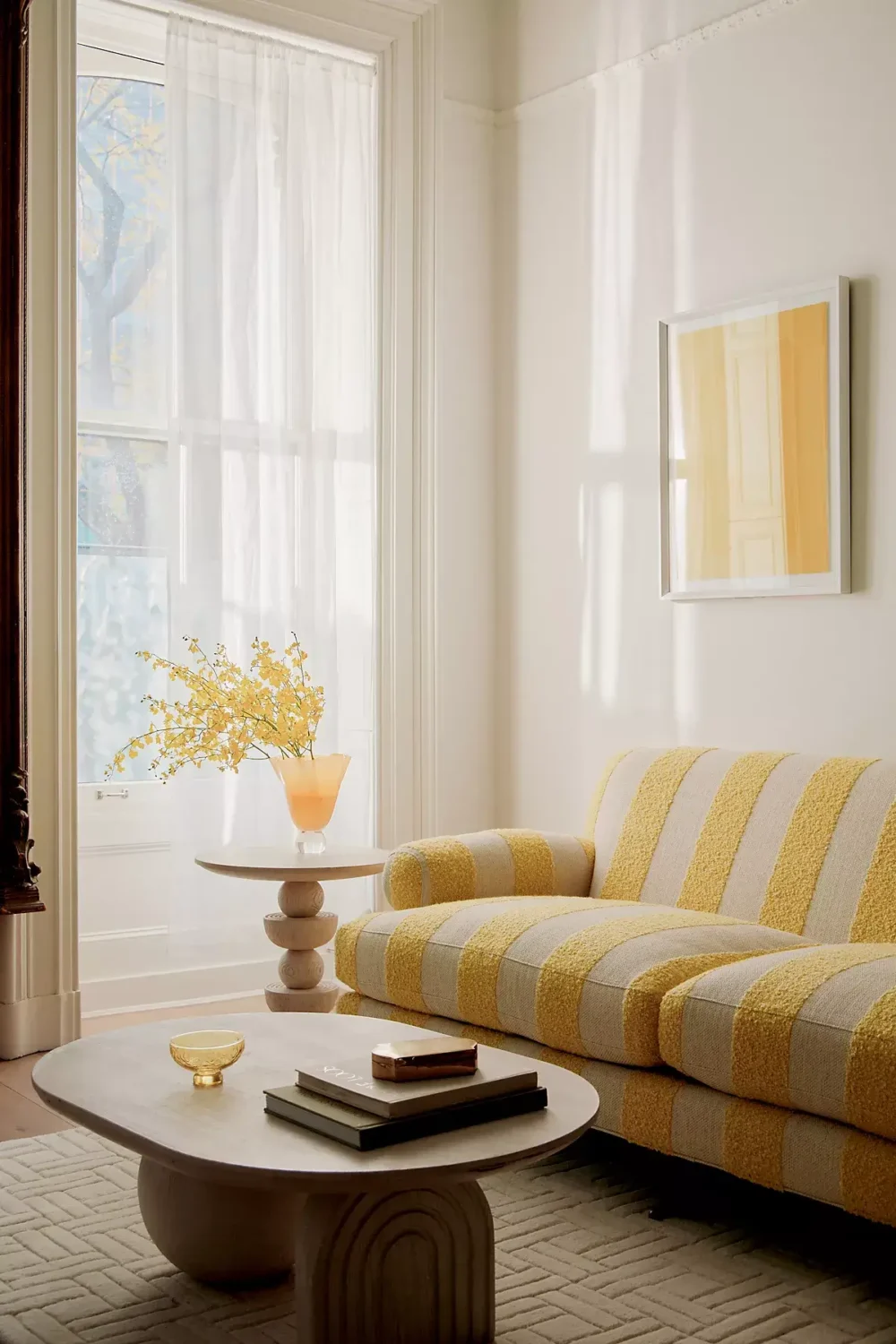 Interior Design Trends for 2024: Comfort, Nature, and Warmth 18 striped-yellow-couch-interior-design-trends-2024-nordroom