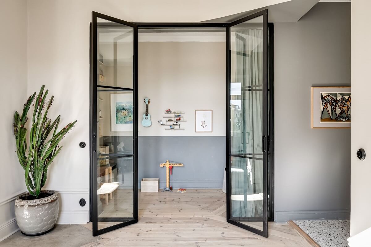 A Custom Headboard in a Light-Filled Swedish Apartment 7 tiny-childrens-room-industrial-glass-doors-nordroom