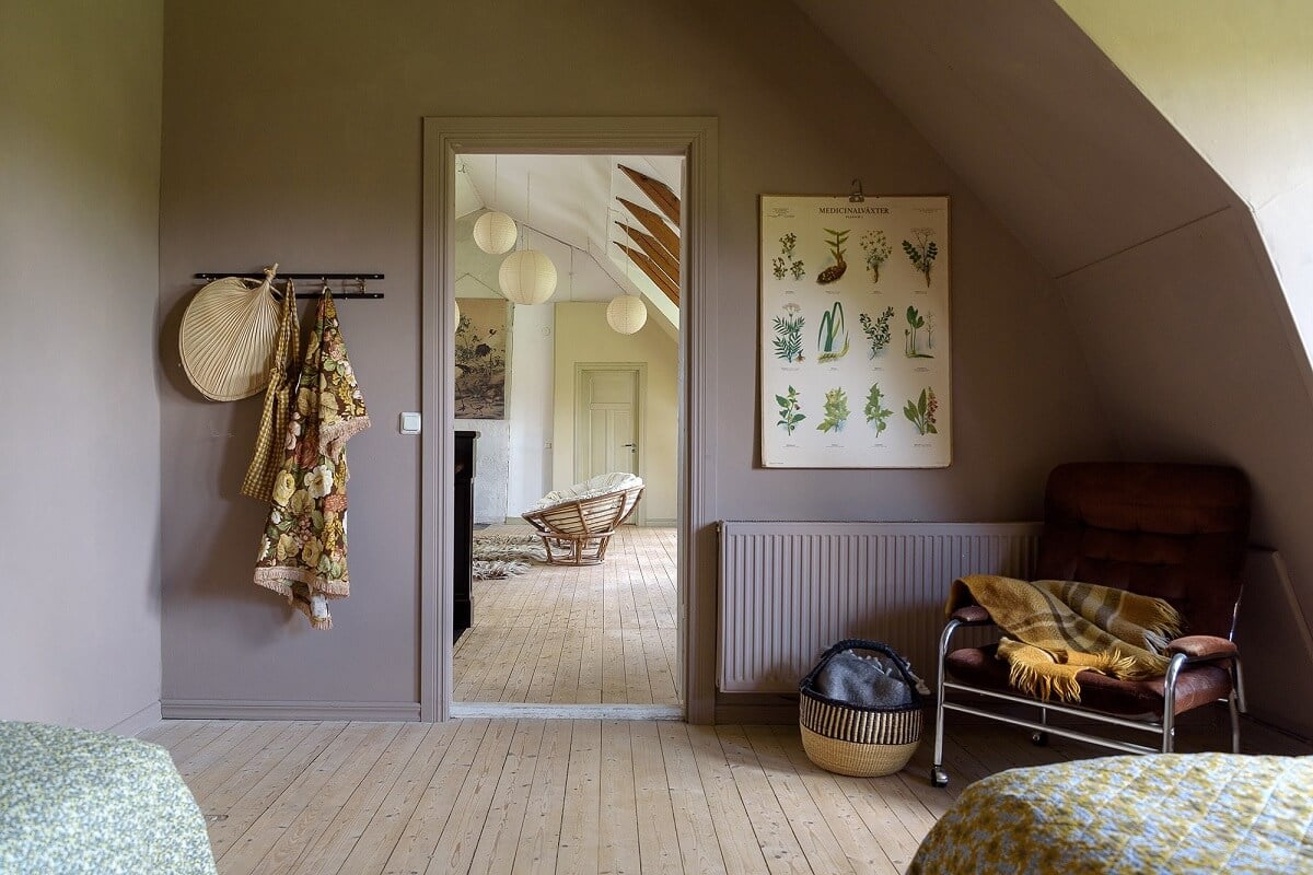 Natural Colors in a Swedish School Conversion 27 twin-bedroom-wooden-floor-slanted-ceiling-nordroom