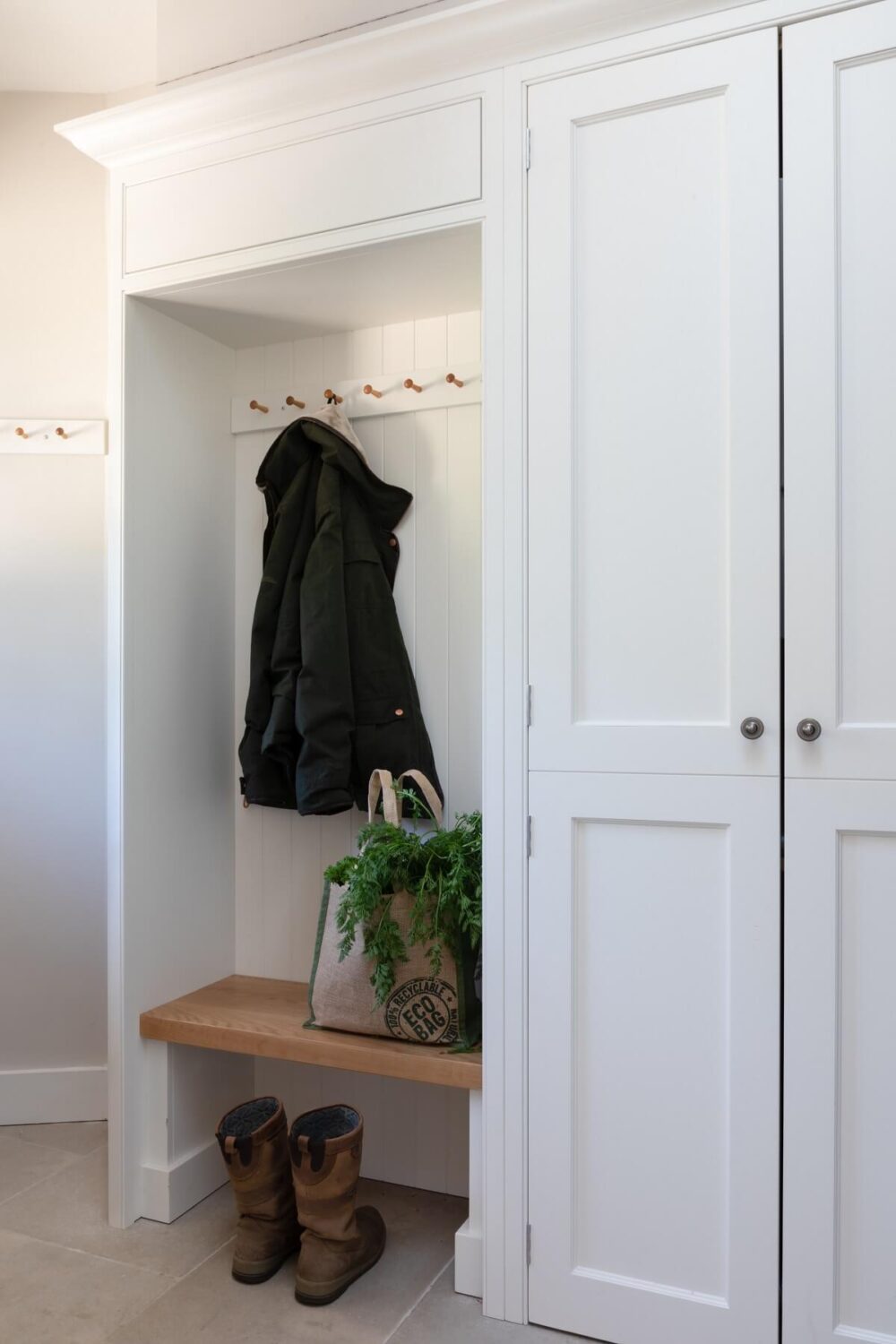 A Light and Social Country Kitchen by The Myers Touch 15 utility-room-coat-storage-wooden-bench-built-in-wardrobes-nordroom