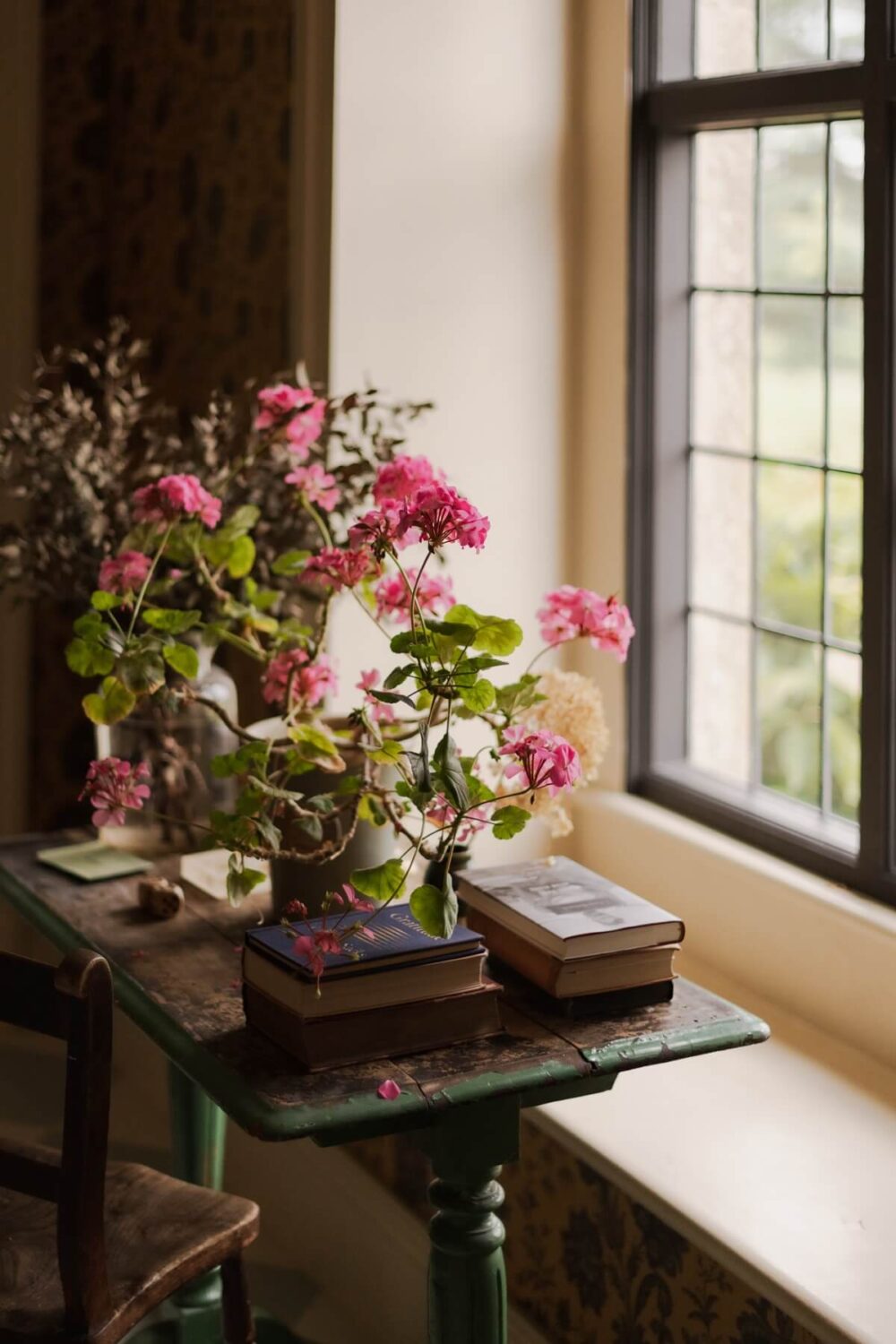 A Colorful Renovated Country House by Clarence & Graves 5 vintage-wooden-table-flowers-nordroom