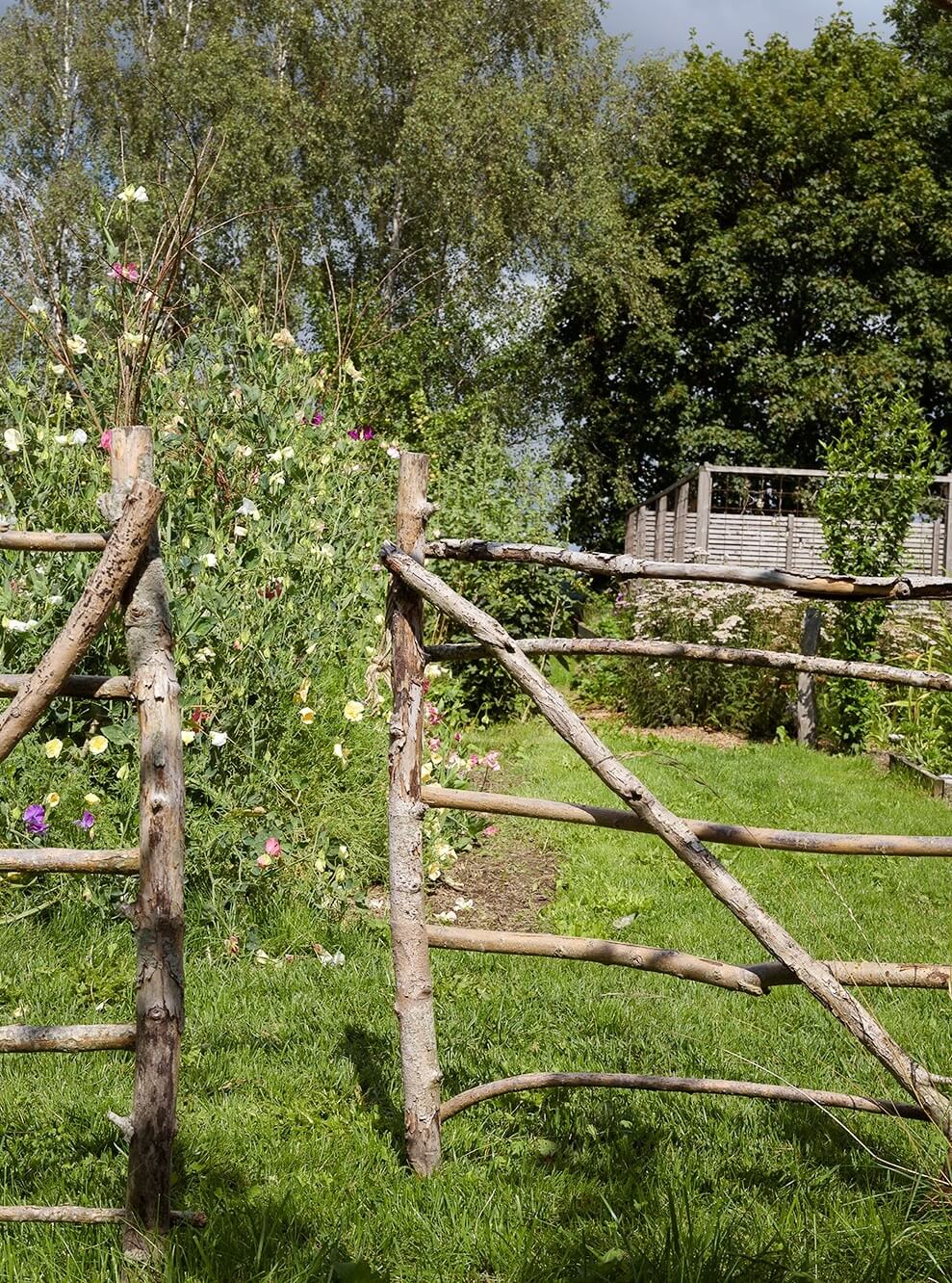Natural Colors in a Swedish School Conversion 33 wooden-fence-garden-school-conversion-nordroom