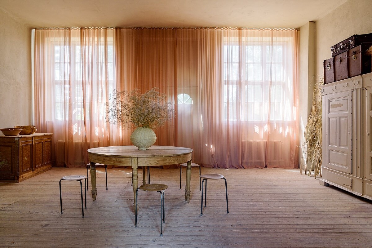 Natural Colors in a Swedish School Conversion 17 workspace-terracotta-colored-curtains-nordroom