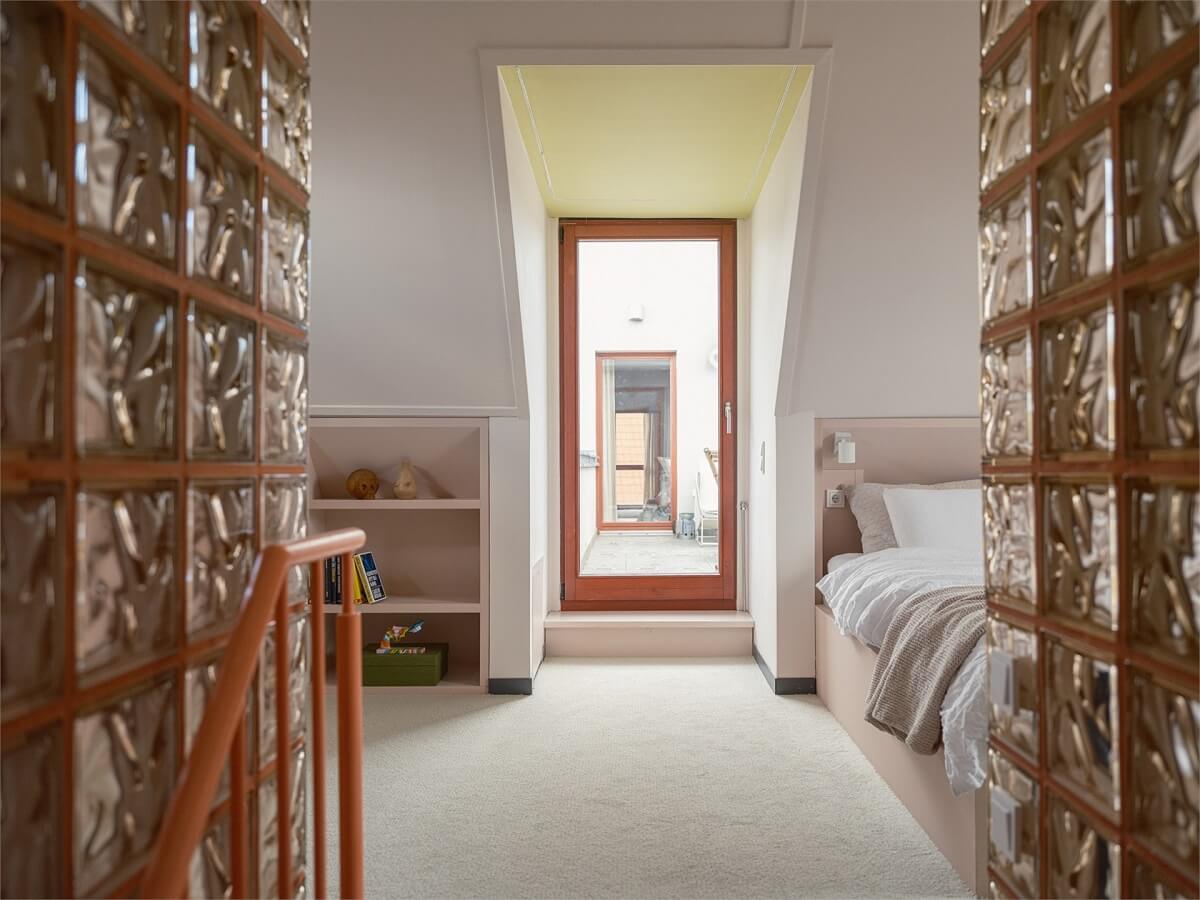 A Colorful Modern Townhouse in Malmö 11 attic-bedroom-acces-roof-terrace-nordroom
