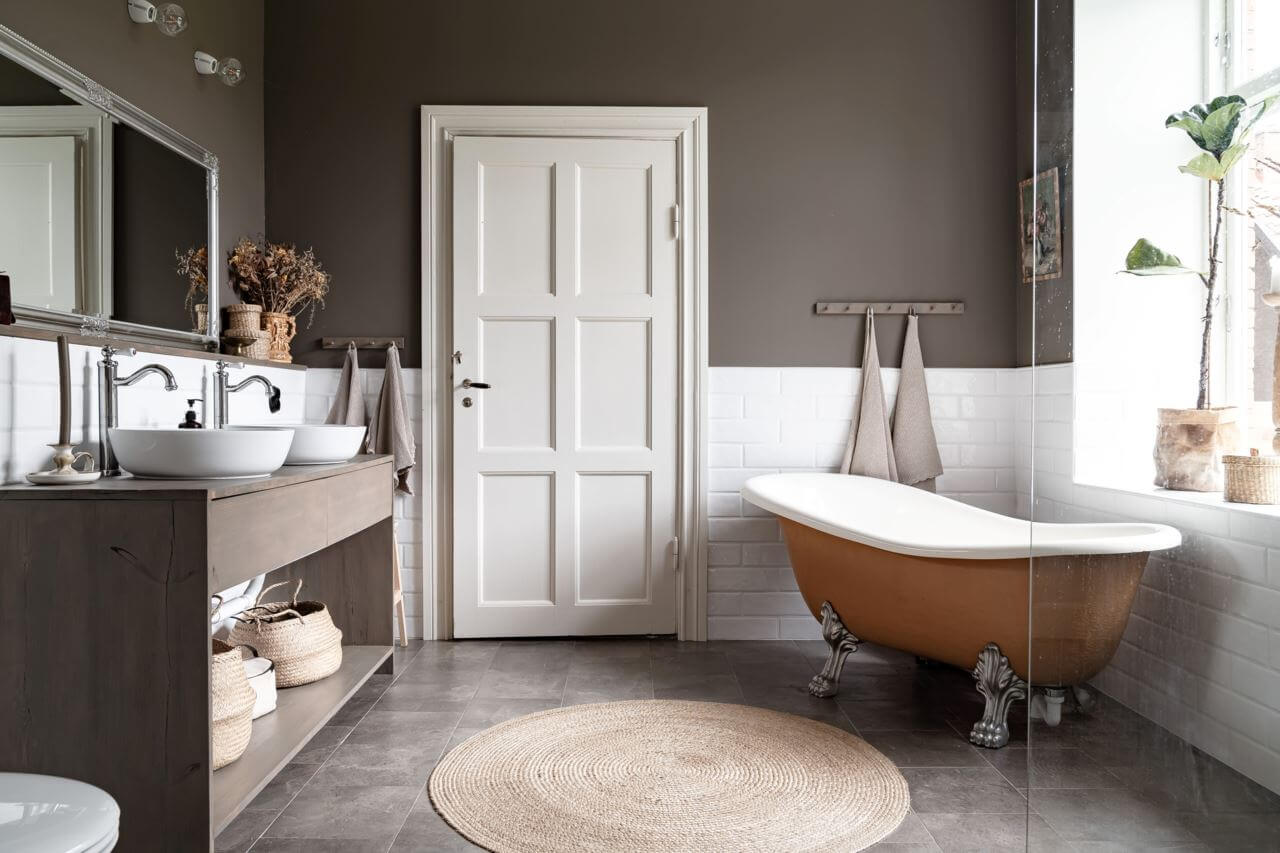 A Former Swedish School is Now a Beautiful Home 23 bathroom-gray-wall-freestanding-bath-nordroom