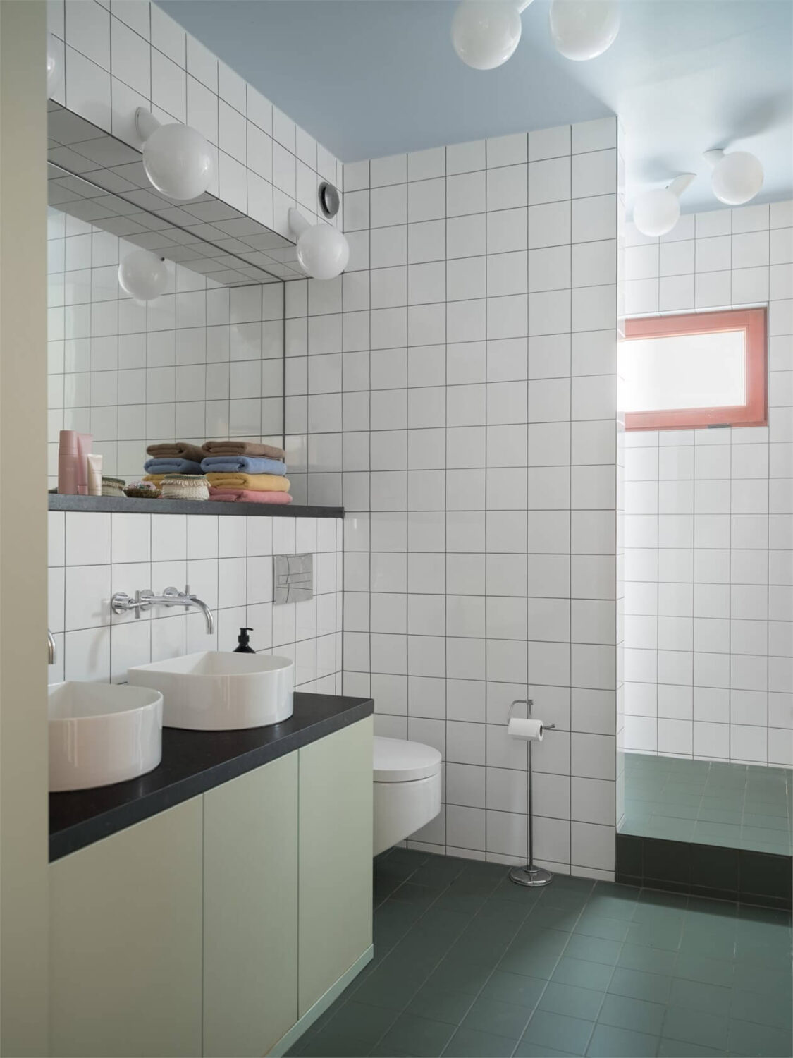 A Colorful Modern Townhouse in Malmö 18 bathroom-white-tiles-light-blue-ceiling-nordroom