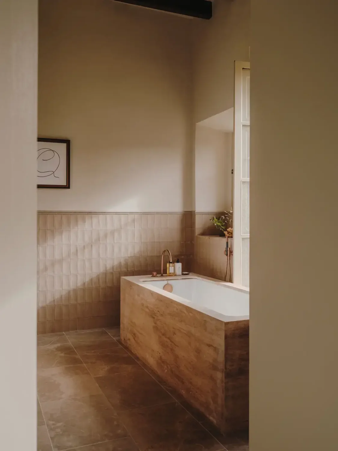 A Historic Townhouse on Majorca with a Striped Pool 16 bathroom-with-bath-townhouse-majorca-ordroom