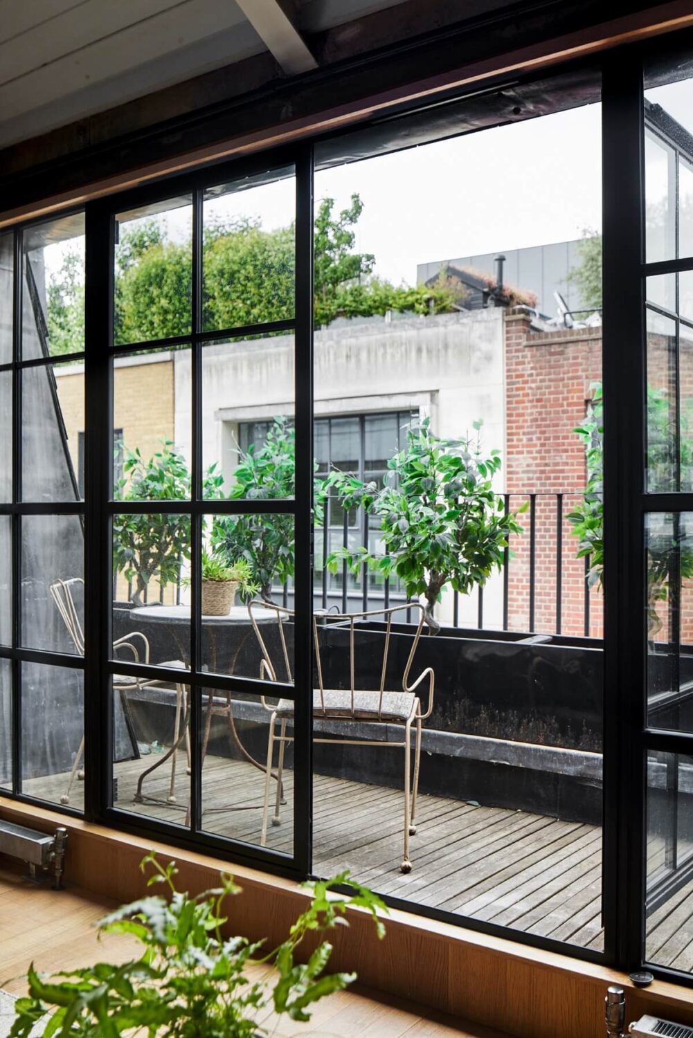 A Modern London Home with Custom Built Oak Furniture 19 bedroom-balcony-steel-framed-walls-nordroom