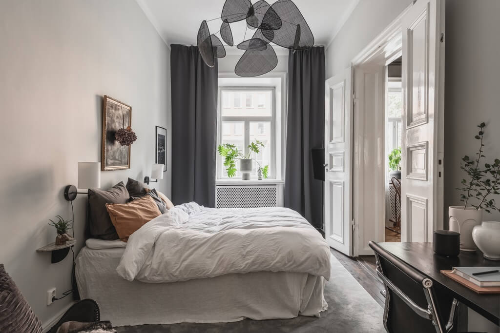 A Dark Gray Painted Ceiling in a Scandi Apartment 13 bedroom-gray-curtains-nordroom
