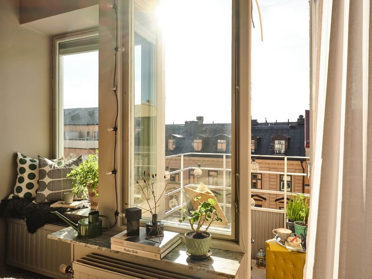 A Serene Beige Apartment with Two Balconies 14 bedroom-window-balcony-nordroom
