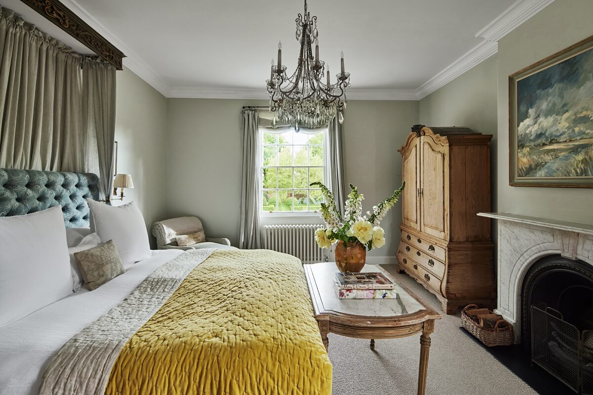 A Restored Georgian House with a Walled Garden 20 bedroom-with-canopy-fireplace-yellow-throw-nordroom
