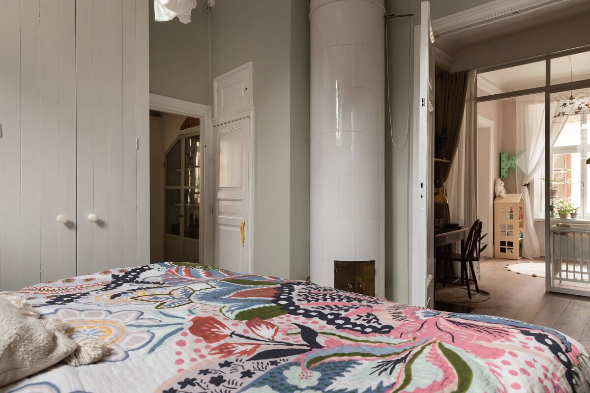 A Lovely Swedish House Revisited 9 bedroom-with-round-fireplace-nordroom
