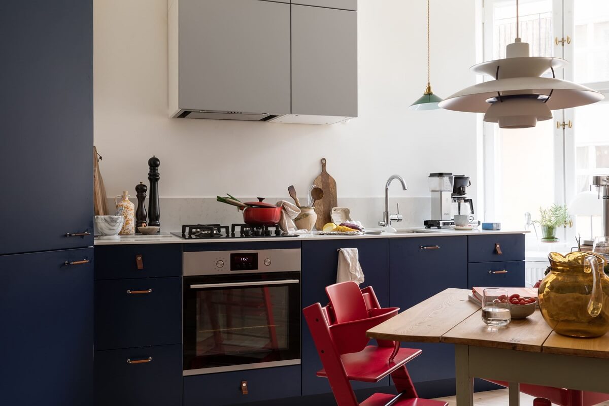 A Light Swedish Apartment with an Industrial Glass Wall 12 blue-scandinavian-kitchen-nordroom