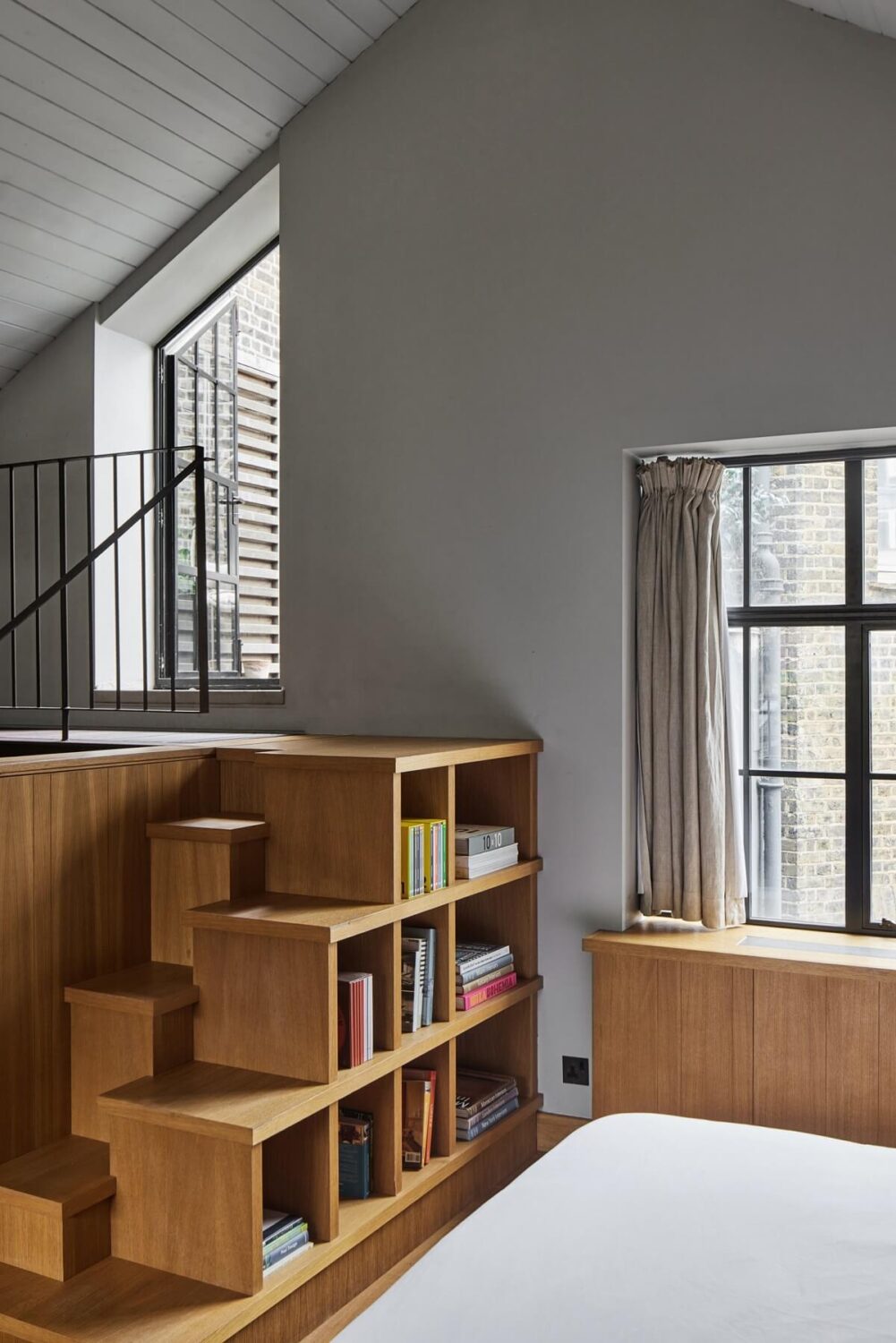 A Modern London Home with Custom Built Oak Furniture 21 built-in-staircase-bookcase-nordroom