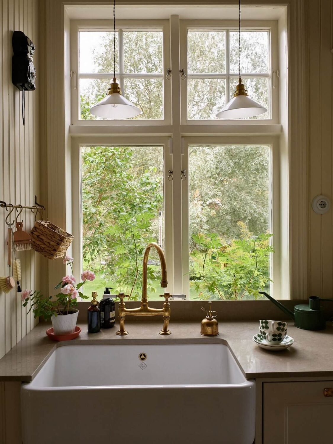 A Beautiful Swedish Country House with a Large Garden 6 butler-sink-kitchen-garden-view-nordroom