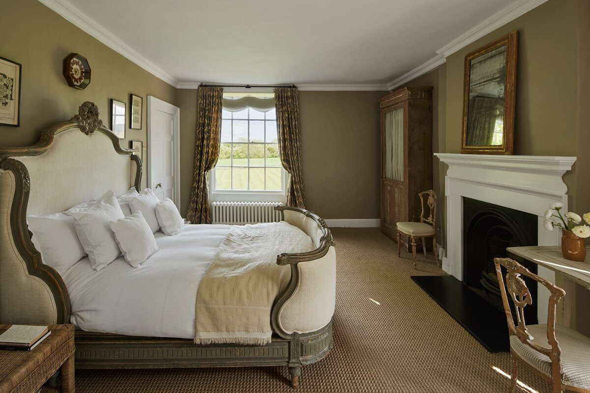 A Restored Georgian House with a Walled Garden 17 classic-bedroom-light-brown-walls-fireplace-nordroom