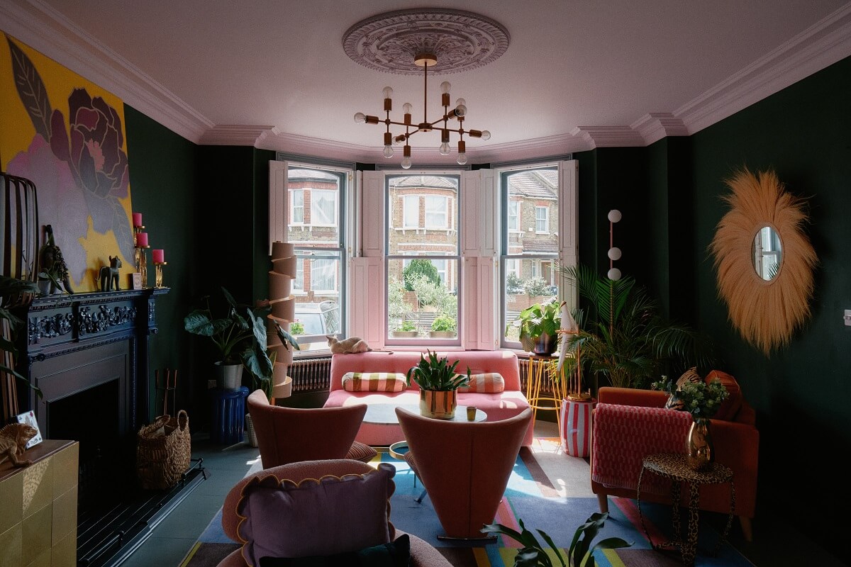 A Fun Colorful Family House in England 5 colorful-living-room-green-walls-bay-window-nordroom