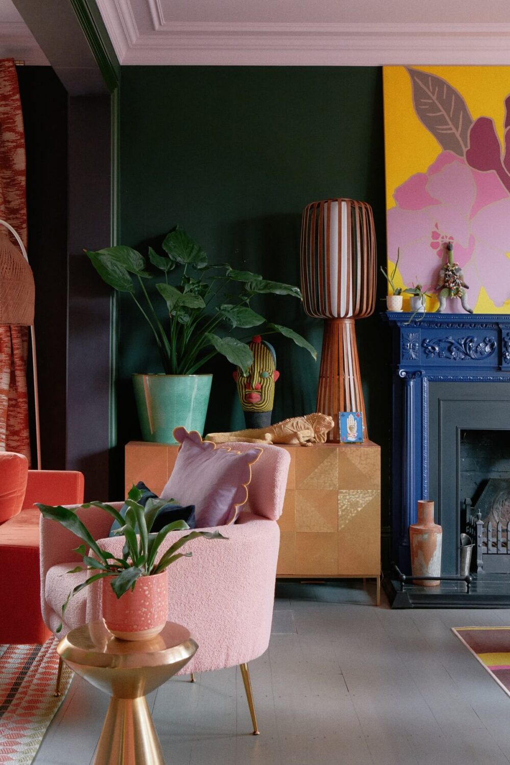 A Fun Colorful Family House in England 4 colorful-living-room-green-walls-blue-fireplace-nordroom