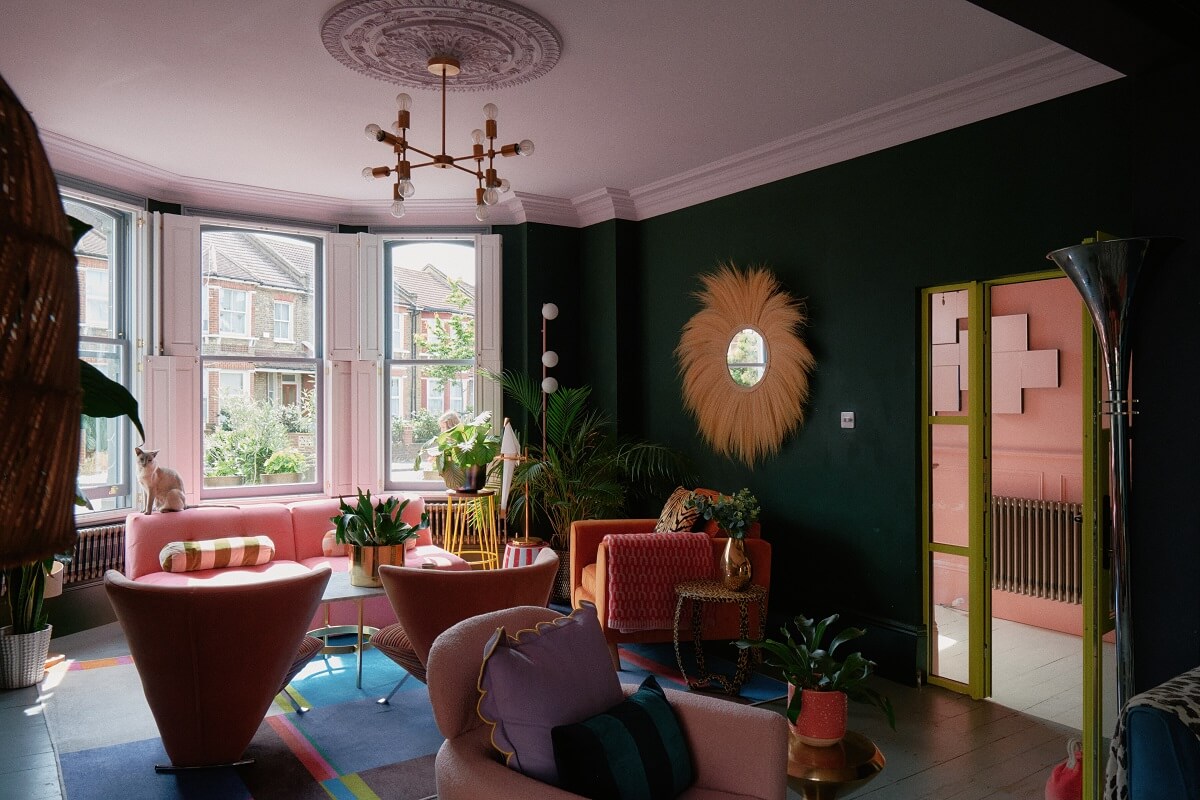 A Fun Colorful Family House in England 2 colorful-living-room-yellow-doorframe