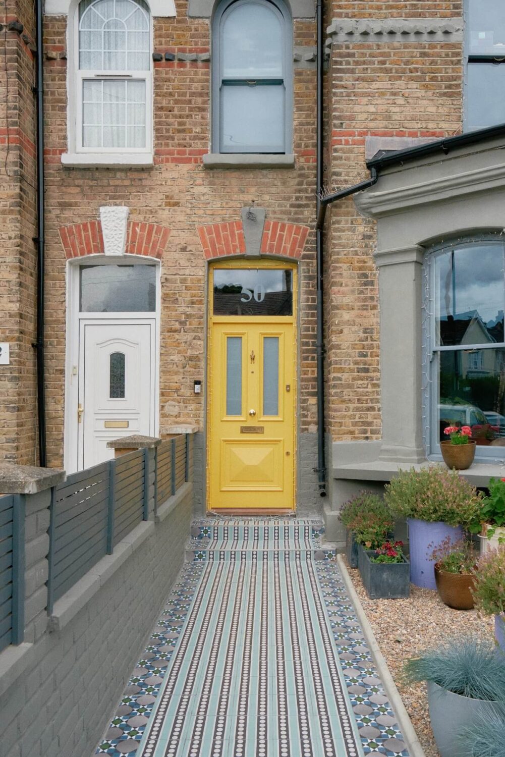 A Fun Colorful Family House in England 38 colorful-london-house-yellow-front-door-nordroom