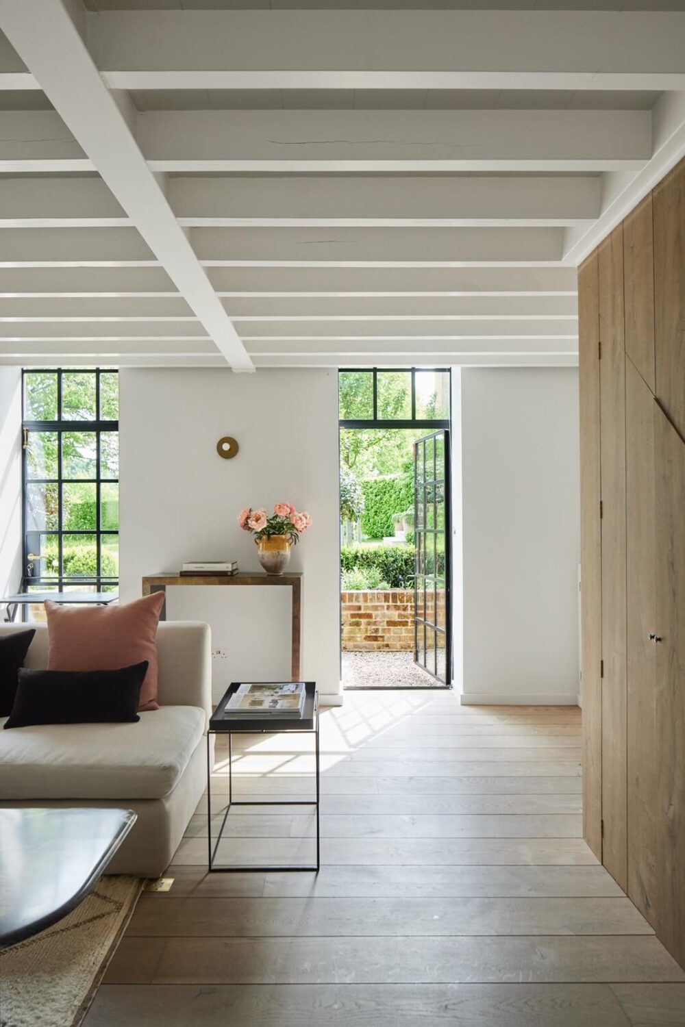 A Restored Georgian House with a Walled Garden 15 contemporary-living-room-wooden-beams-nordroom