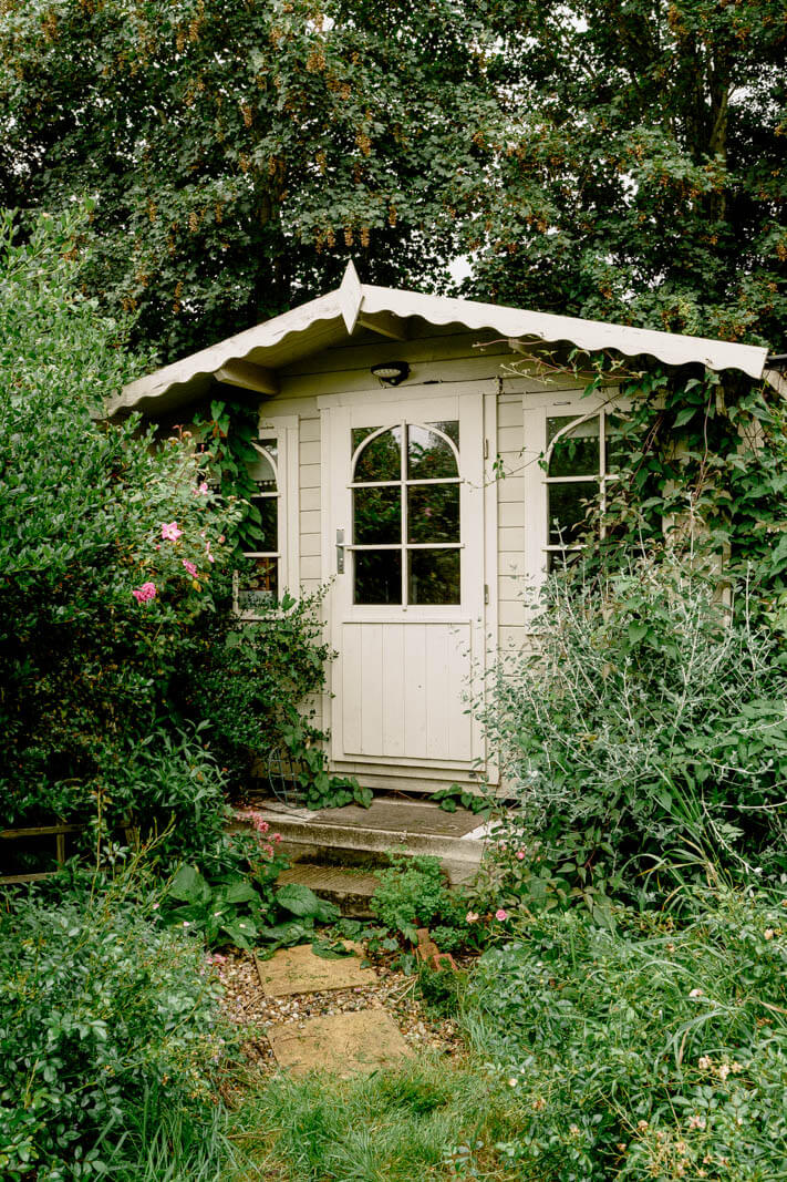 A Charming English Cottage with Color Accents 20 cottage-garden-shed-nordroom