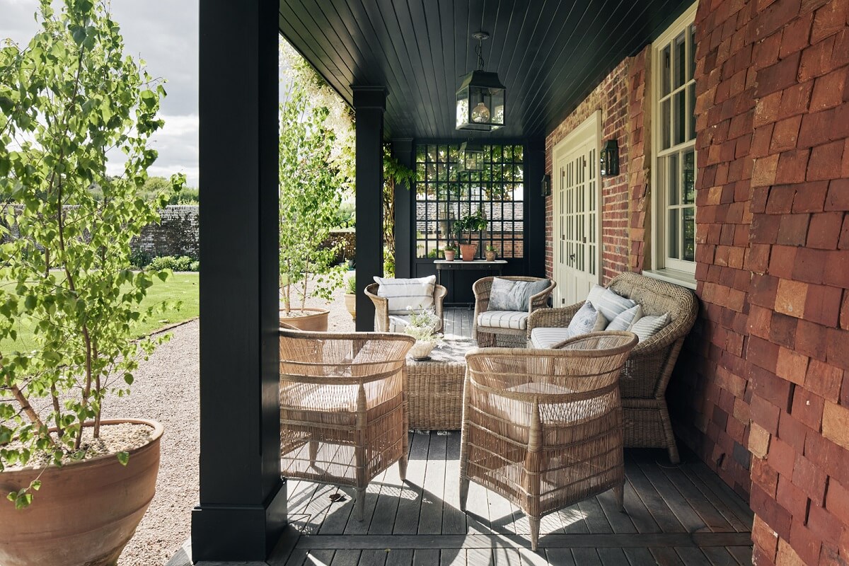 Best of 2023: Outdoor Spaces 27 covered-outdoor-terrace-wicker-furniture-nordroom