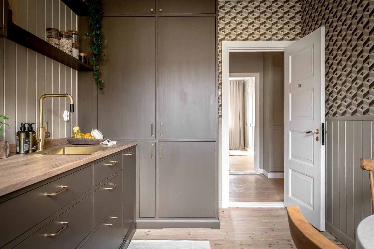 A Serene Studio Apartment with a Brown Kitchen 17 custom-ikea-kitchen-brown-cabinets-open-shelves-nordroom