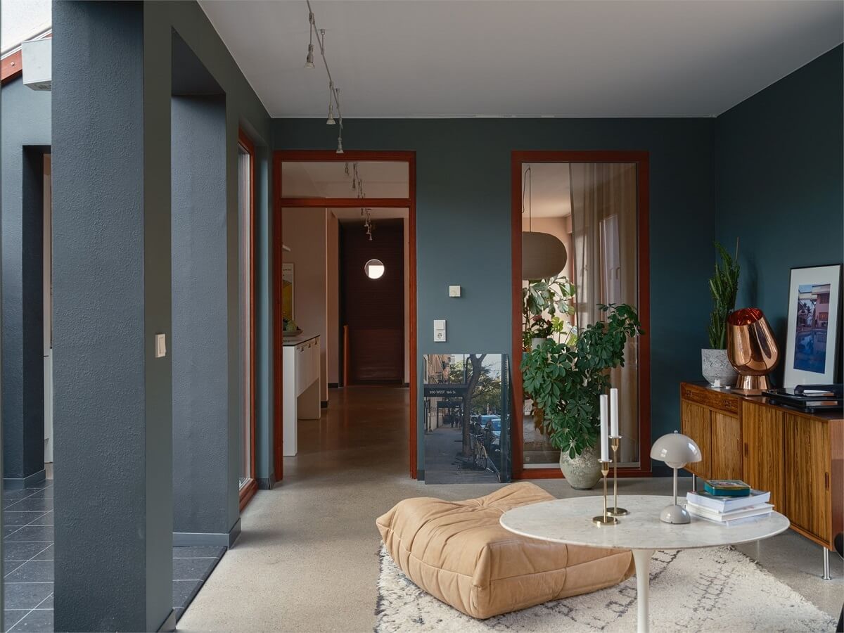 A Colorful Modern Townhouse in Malmö 7 dark-blue-living-room