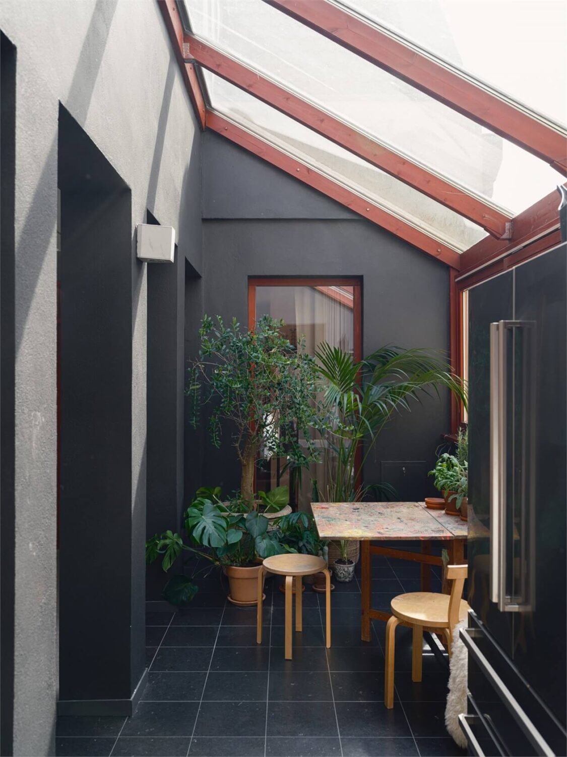 A Colorful Modern Townhouse in Malmö 4 dark-breakfast-room-skylights-nordroom