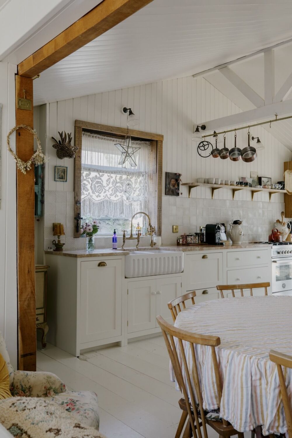 Pearl Lowe's Vintage Boho English Beach House is For Sale 3 devol-kitchen-wooden-beam-nordroom