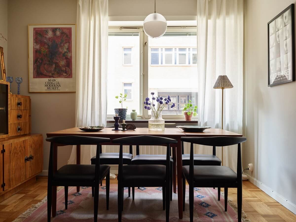 A Scandinavian Apartment with a Fresh Blue Bedroom 3 dining-table-living-room-nordroom