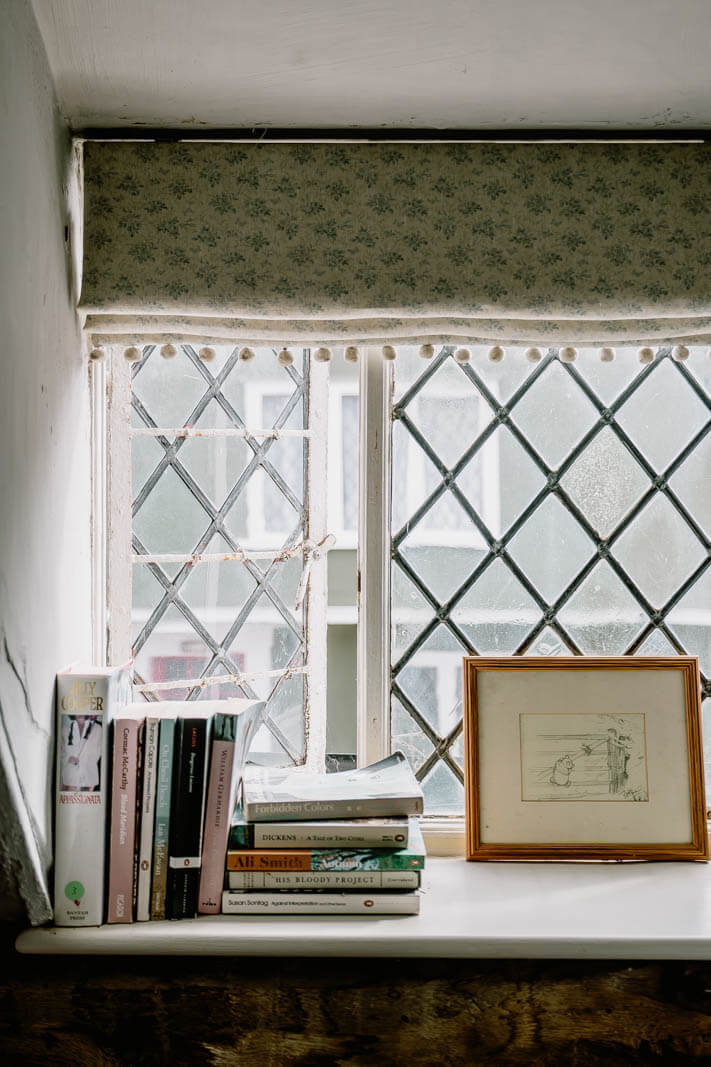 A Charming English Cottage with Color Accents 8 english-cottage-window-nordroom