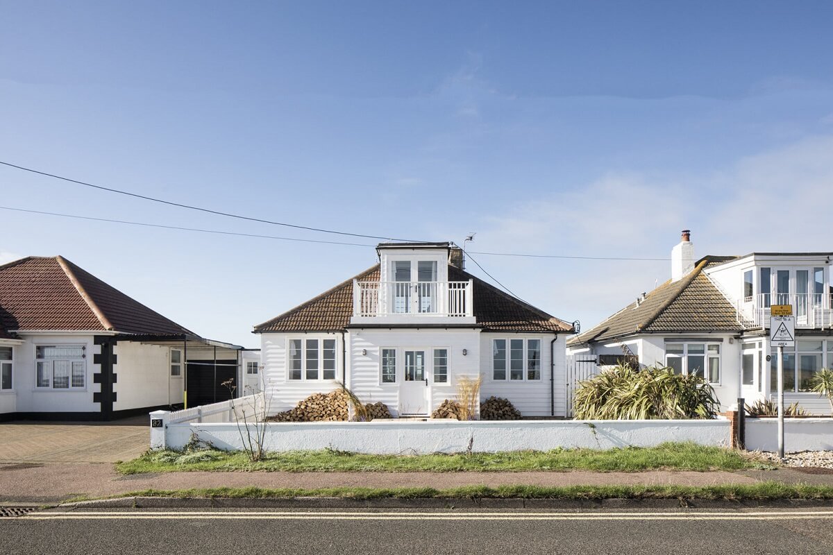 A Bright Coastal Home with Blue Color Accents in England 20 exterior-coastal-home-england-nordroom