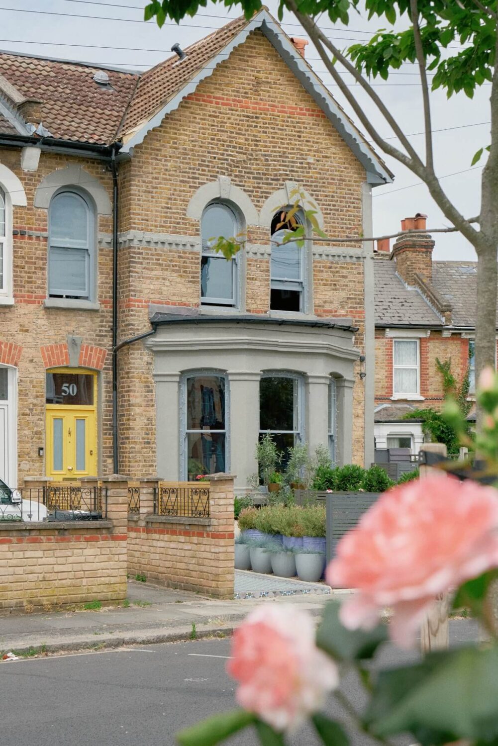 A Fun Colorful Family House in England 39 exterior-colorful-london-house-yellow-door-nordroom