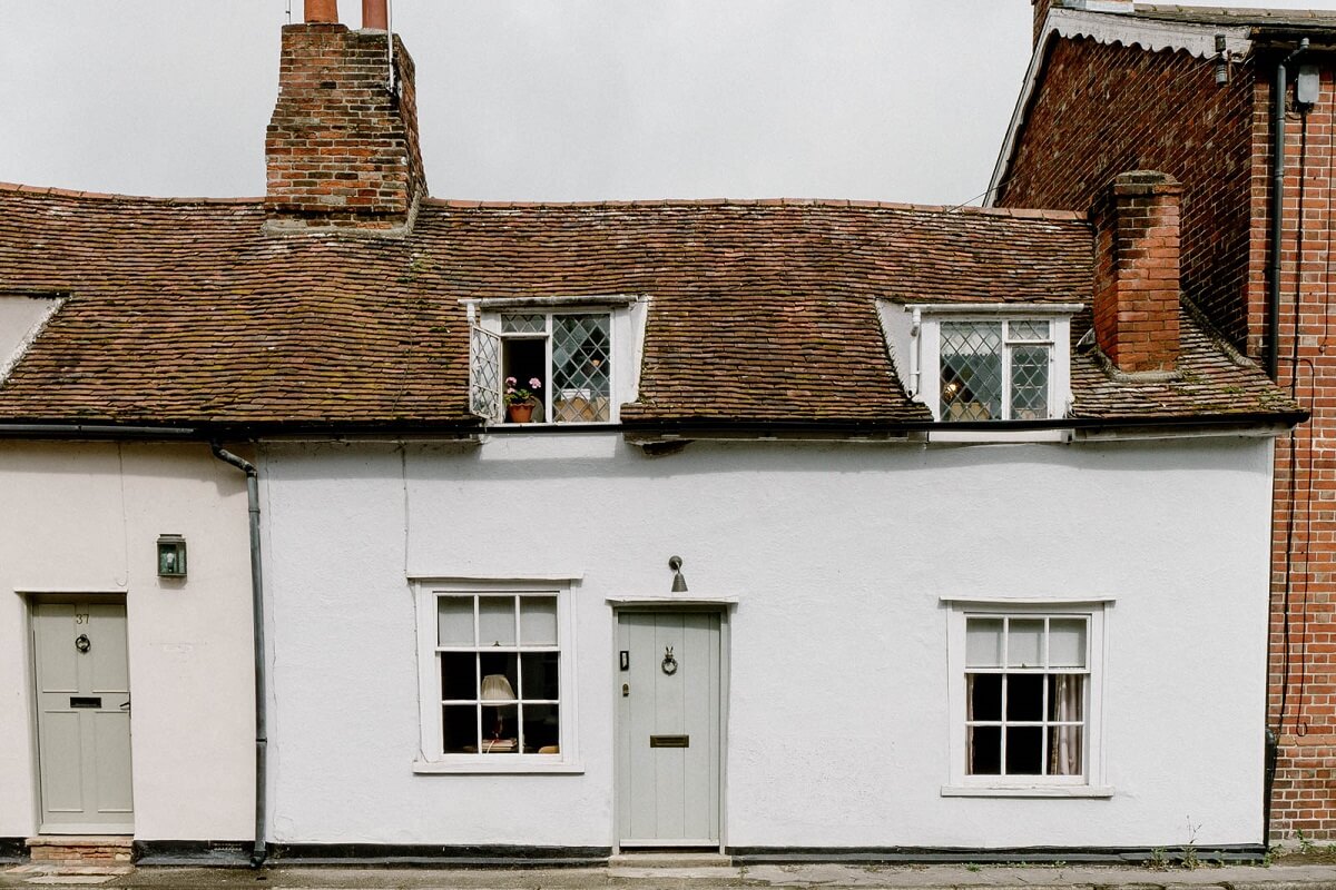 A Charming English Cottage with Color Accents 23 exterior-white-english-cottage-nordroom