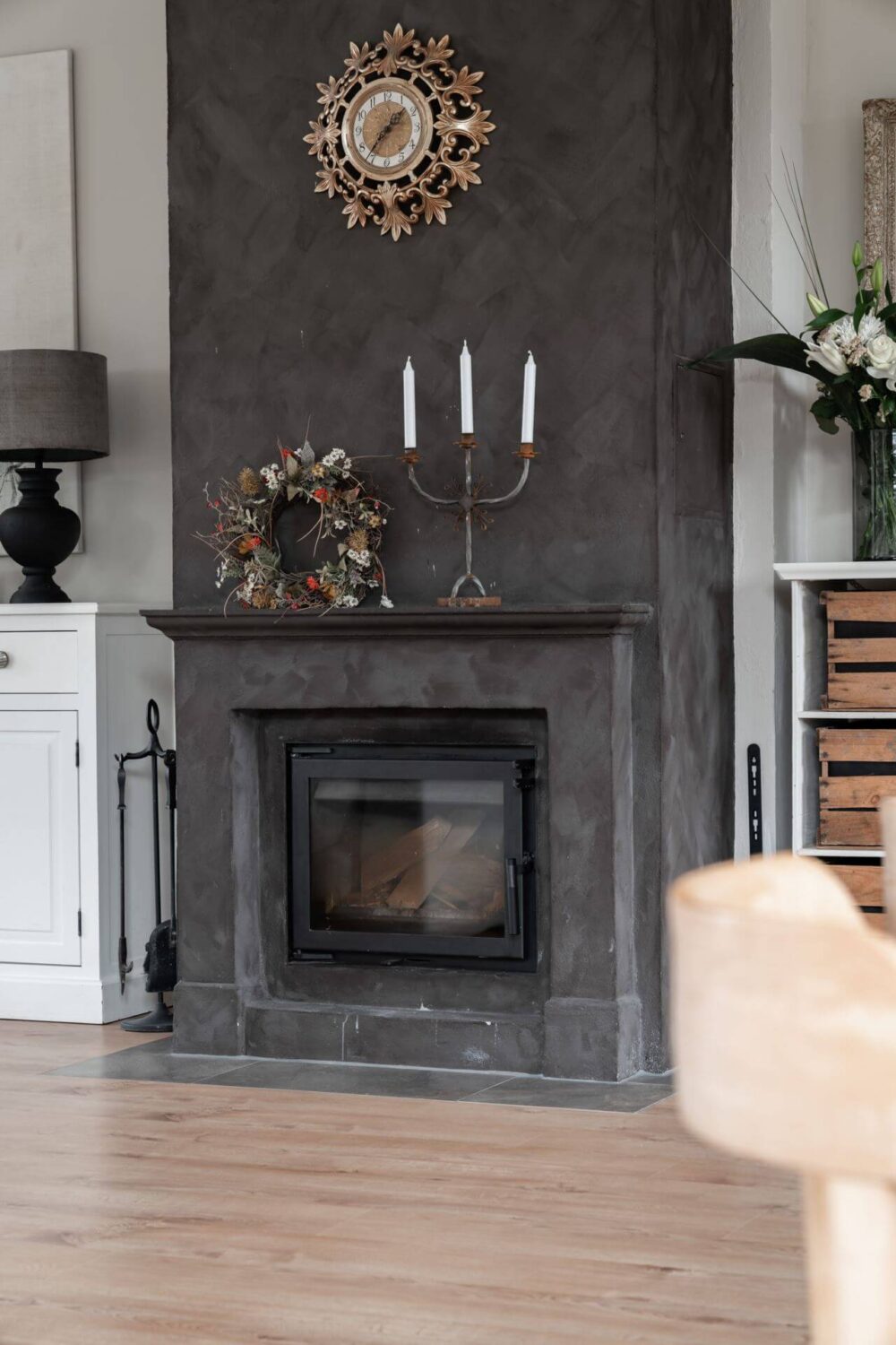 A Former Swedish School is Now a Beautiful Home 13 fireplace-dark-gray-accent-wall-nordroom