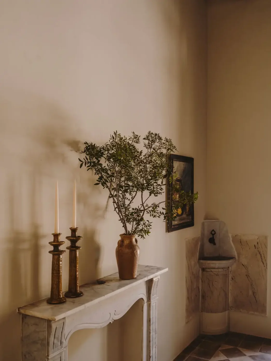 A Historic Townhouse on Majorca with a Striped Pool 11 fireplace-mantel-detail-townhouse-majorca-nordroom