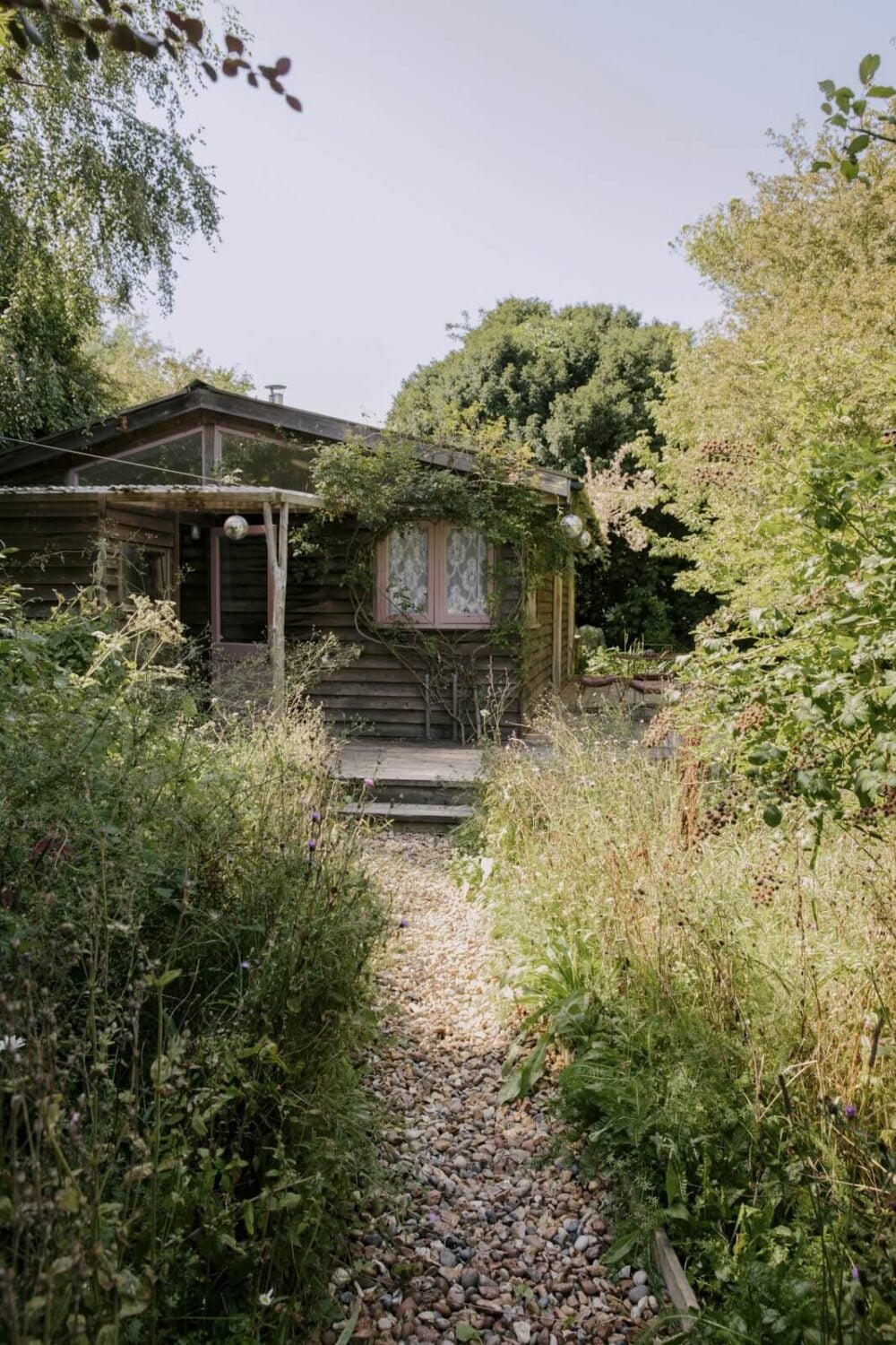 Pearl Lowe's Vintage Boho English Beach House is For Sale 17 garden-cabin-pearl-lowe-beach-house-nordroom