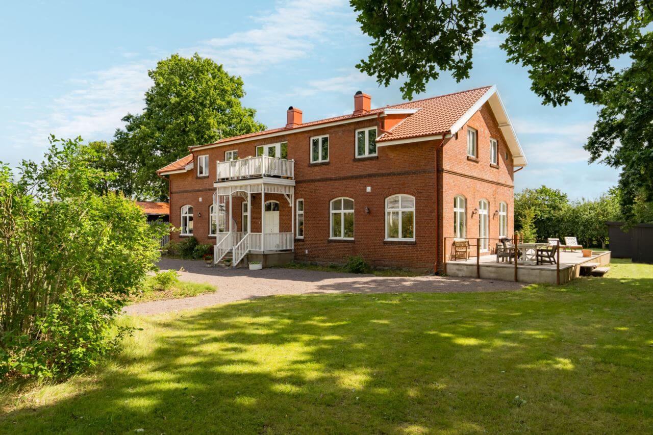 A Former Swedish School is Now a Beautiful Home 32 garden-exterior-brick-house-sweden-nordroom