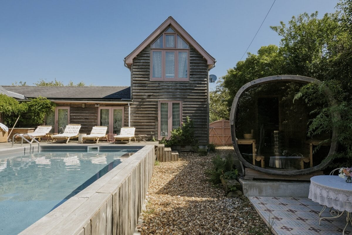 Pearl Lowe's Vintage Boho English Beach House is For Sale 27 garden-seating-swimming-pool-pearl-lowe-nordroom