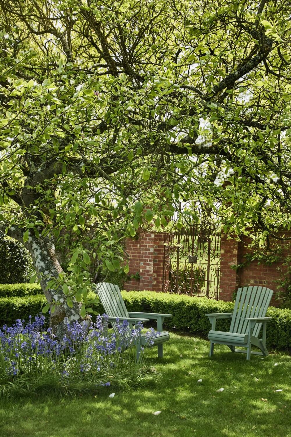 Best of 2023: Outdoor Spaces 26 garden-seating-under-a-tree-nordroom