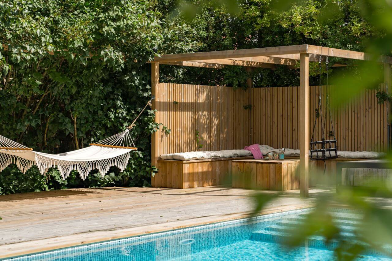 A Former Swedish School is Now a Beautiful Home 31 garden-swimming-pool-hammock-nordroom