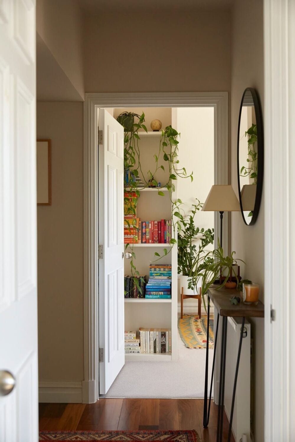 A Light Attic Apartment in London 9 hallway-narrow-table-round-mirror-nordroom